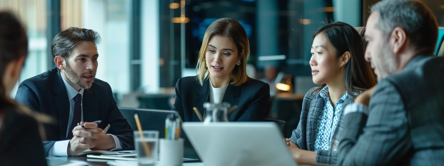 business professionals engage in a strategic discussion surrounded by bold visuals and branding elements.