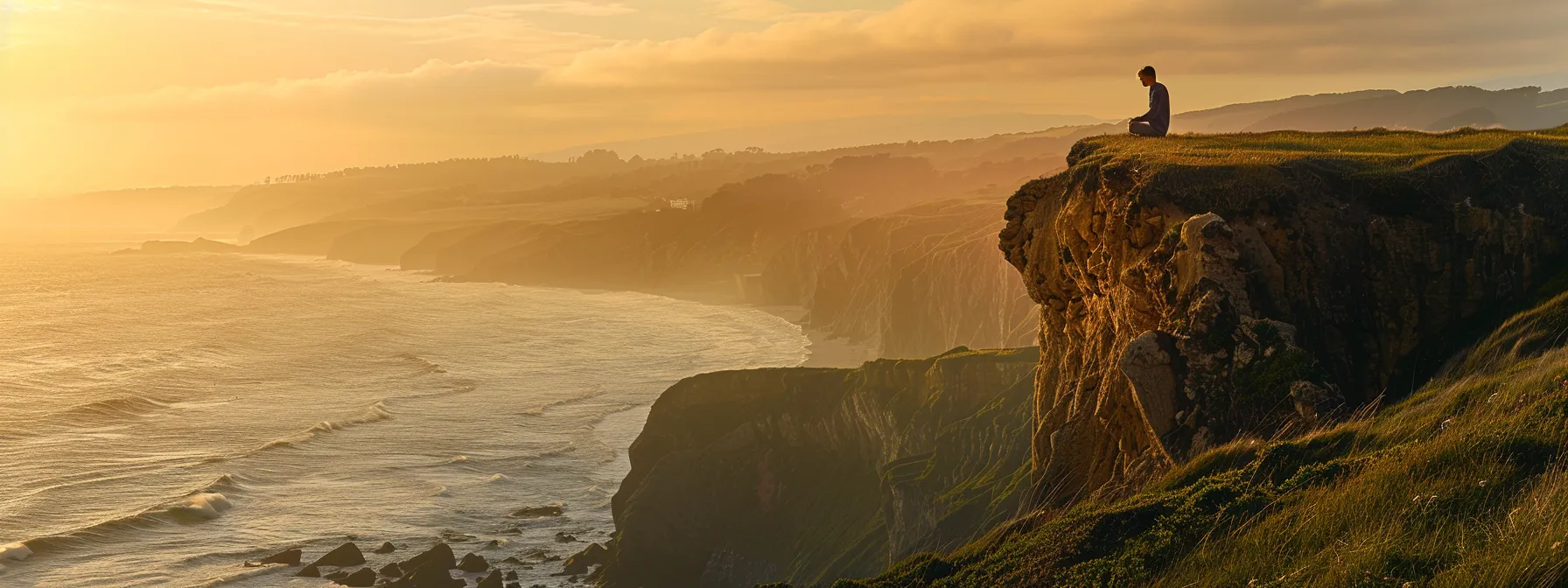 a serene landscape at sunrise, featuring a lone figure meditating on a cliff's edge, embodying the tranquility and clarity essential for personal growth and self-improvement.