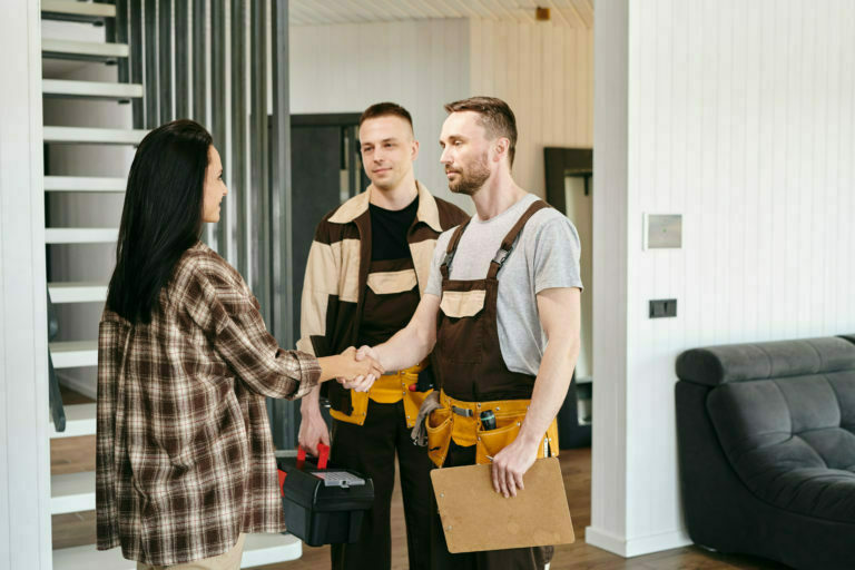 a group of people standing in a room
