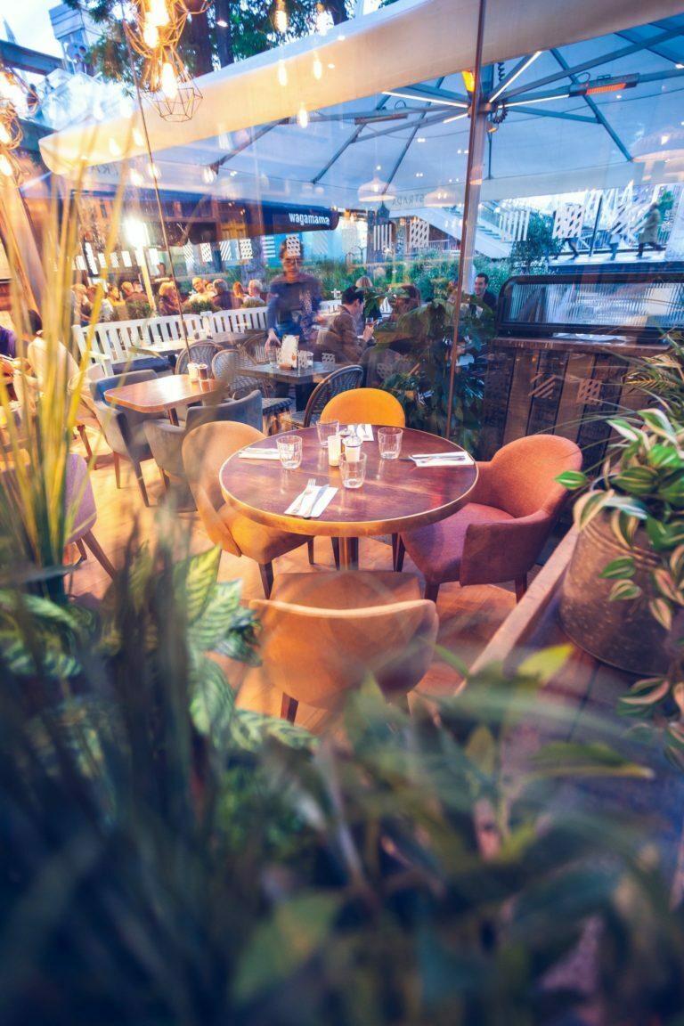 a table with a glass umbrella